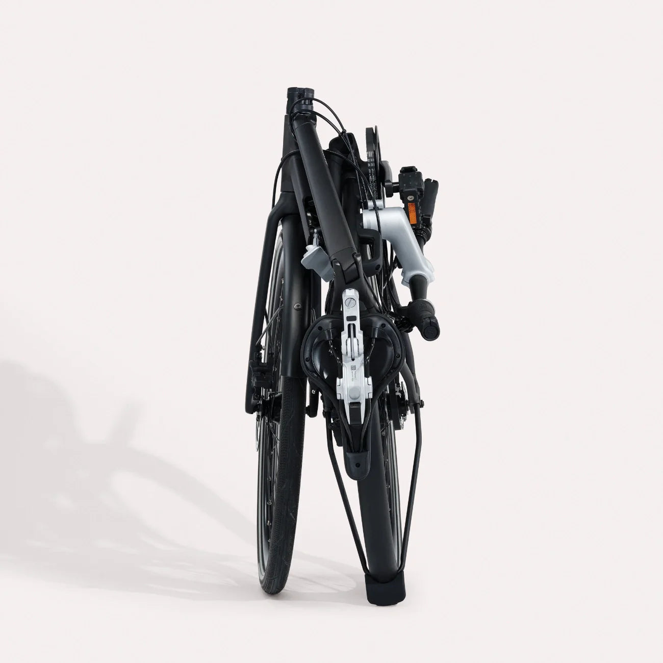 Folded bicycle on a white background