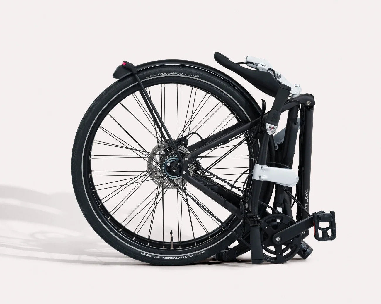 Foldable Bastille bicycle on a white background