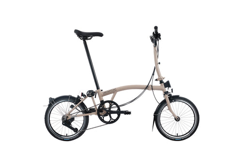 Brompton Foldable bicycle on a white background