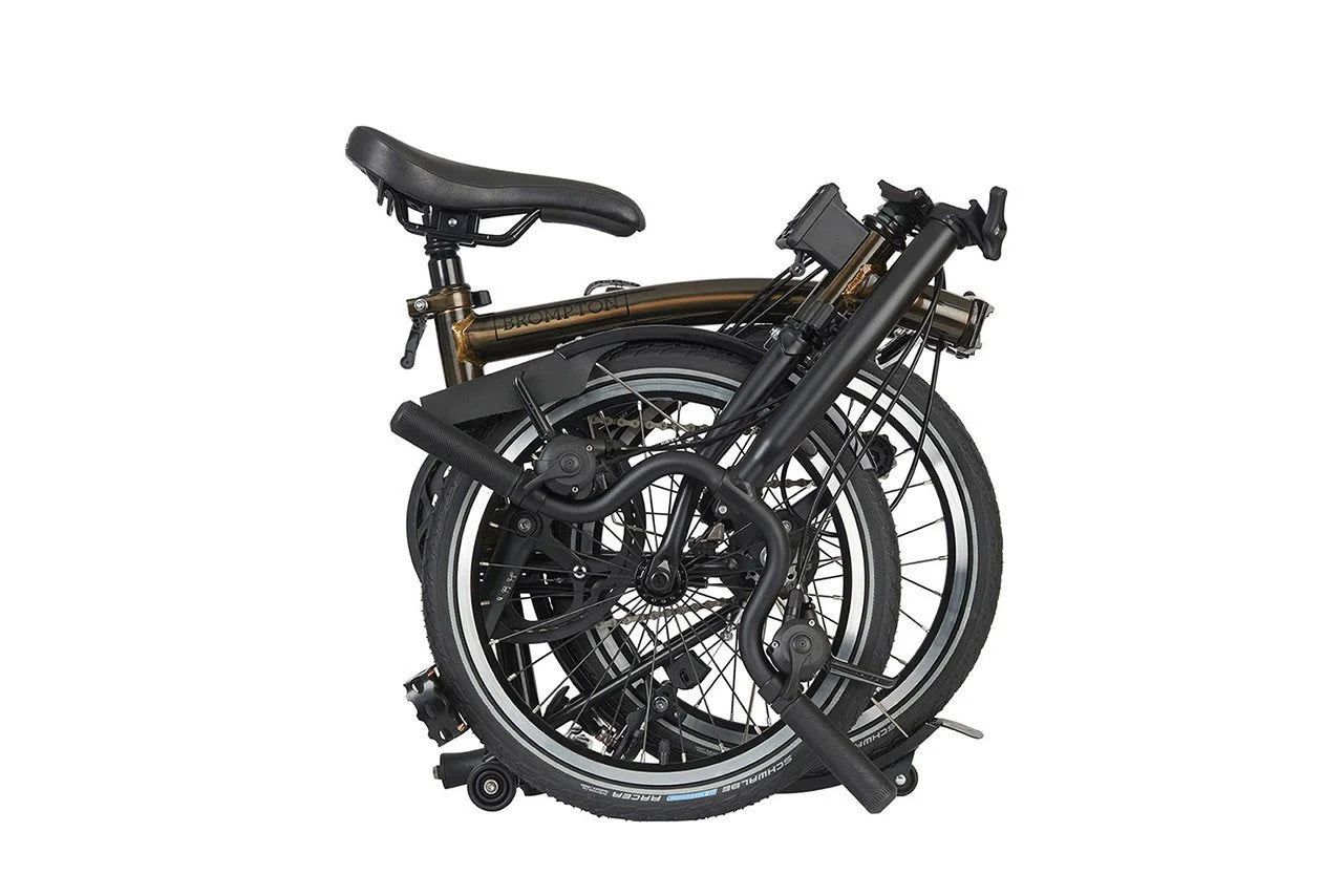 Brompton folding bicycle on a white background