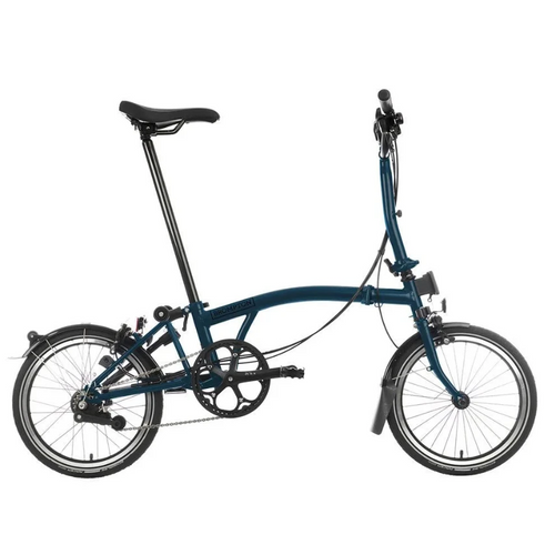 Brompton Blue folding bicycle on a white background