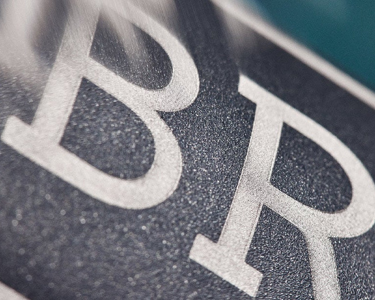 Close-up of a Brompton T Line frame on a blurred background