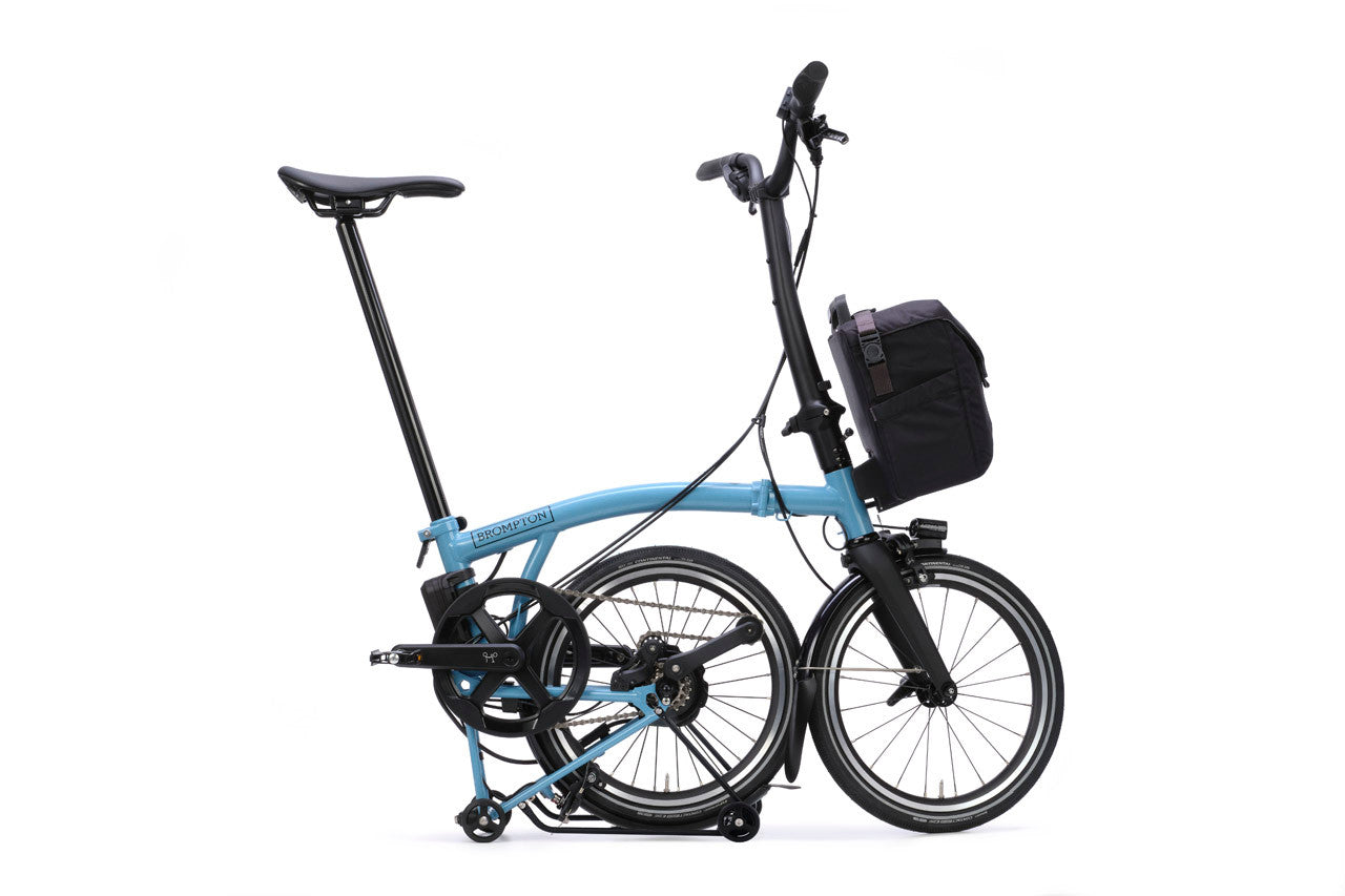 Blue folding bicycle on a white background