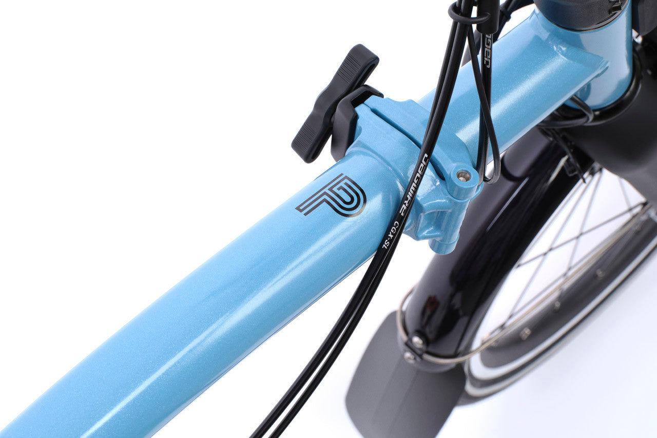 Close-up of a blue bicycle frame with visible branding on a white background