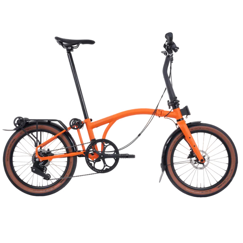 Orange Brompton G Line folding bicycle on a white background