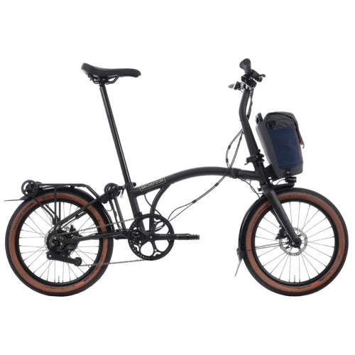 Brompton G Line Electric folding bike on the white background.