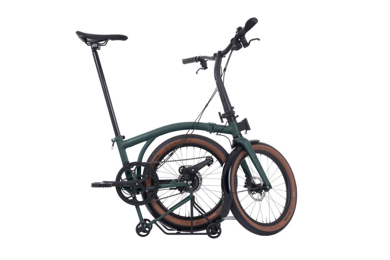 Foldable Brompton bicycle on a white background