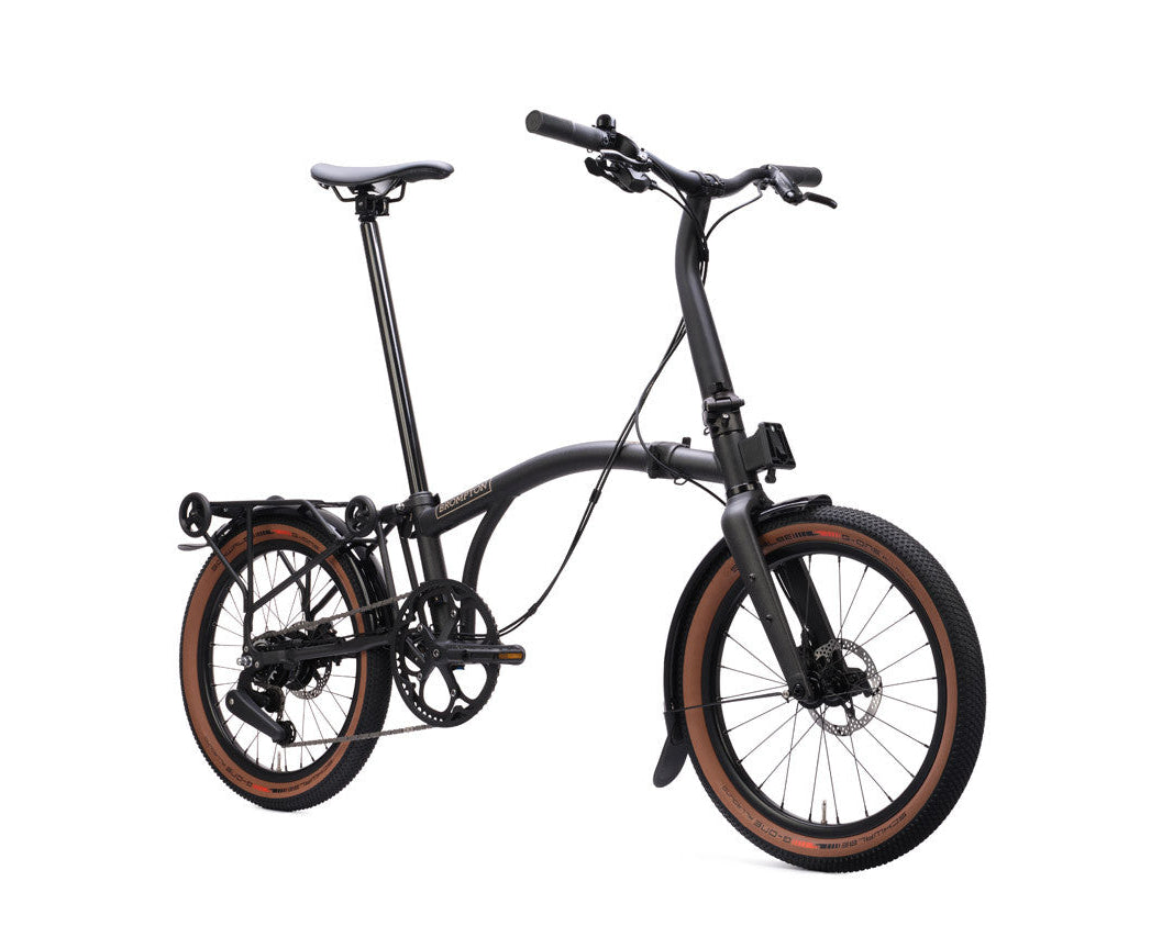Black Brompton G Line folding bicycle on a white background