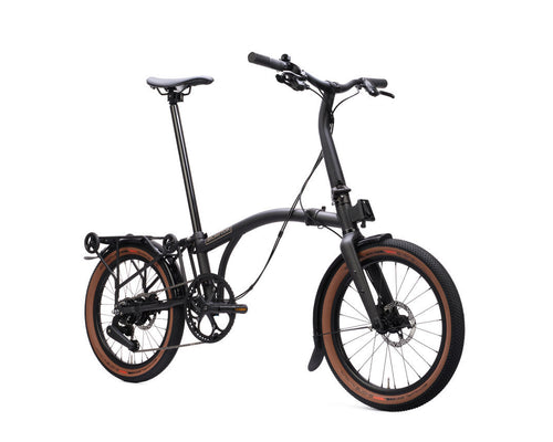 Black Brompton G Line folding bicycle on a white background