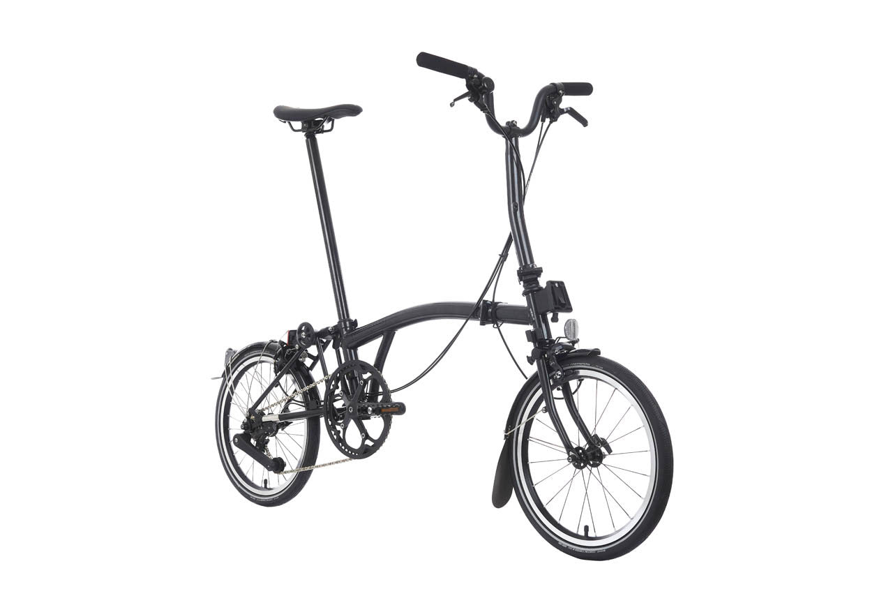 Black folding bicycle on a white background