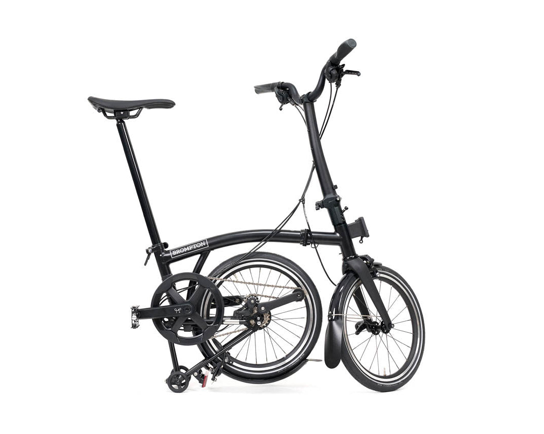 Black Brompton P Line folding bicycle on a white background