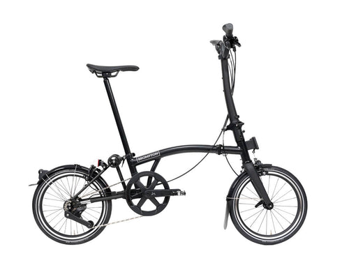 Black Brompton P Line folding bicycle on a white background
