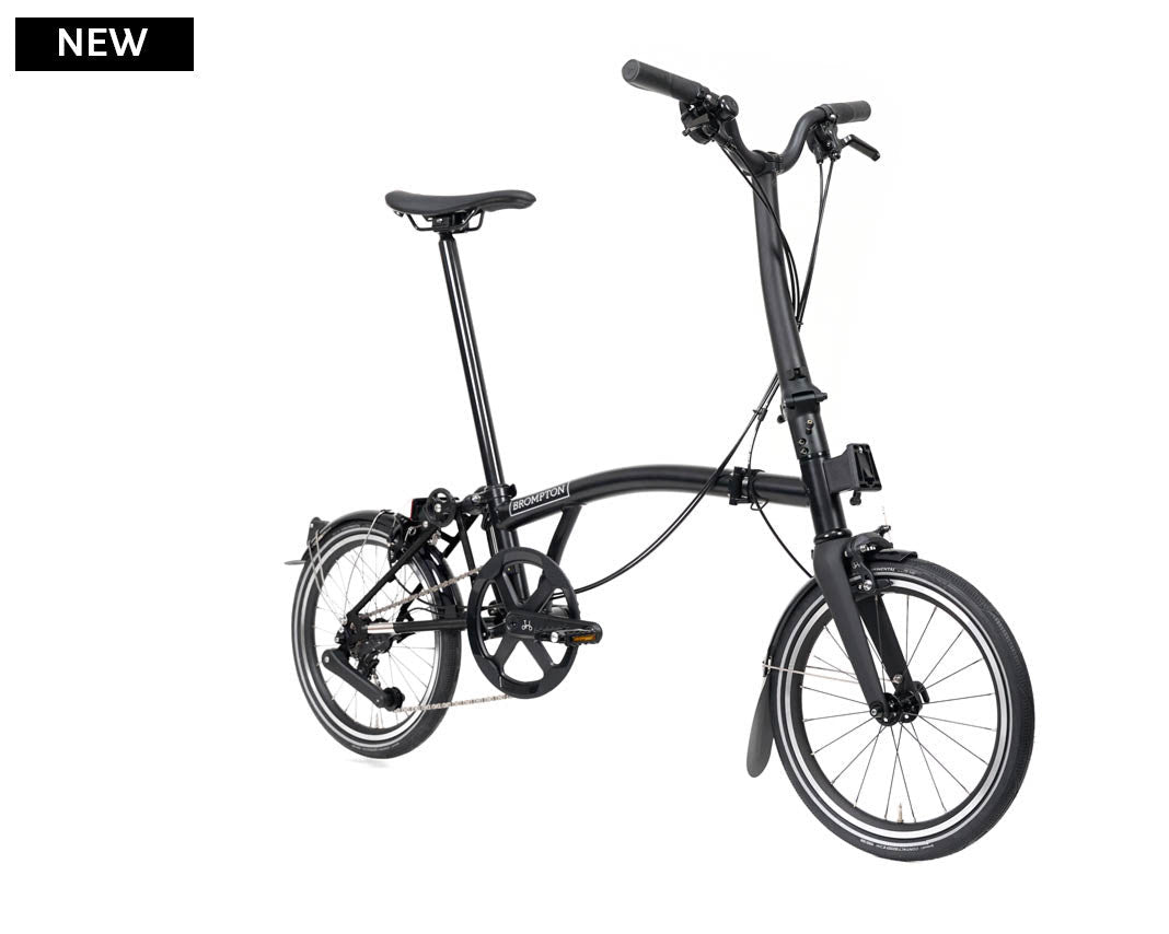 Black Brompton P Line folding bicycle on a white background