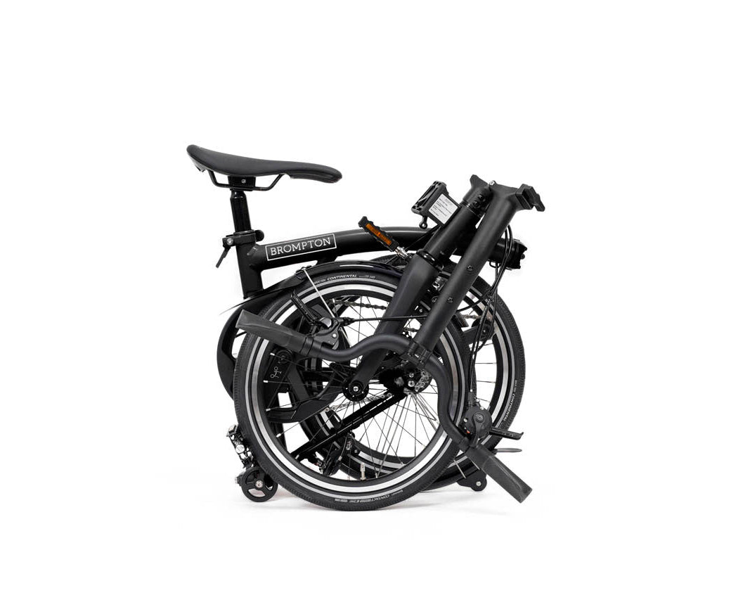 Foldable Brompton P Line bicycle on a white background