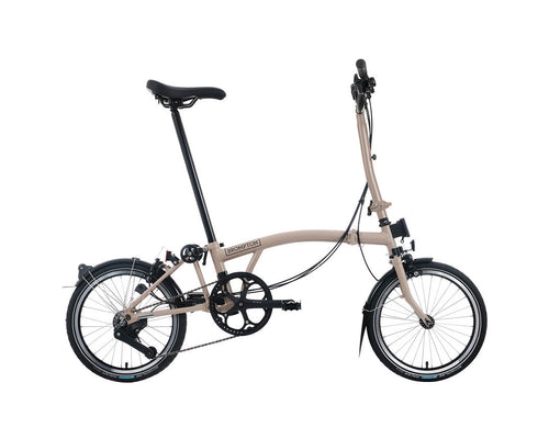 Brompton folding bicycle on a white background
