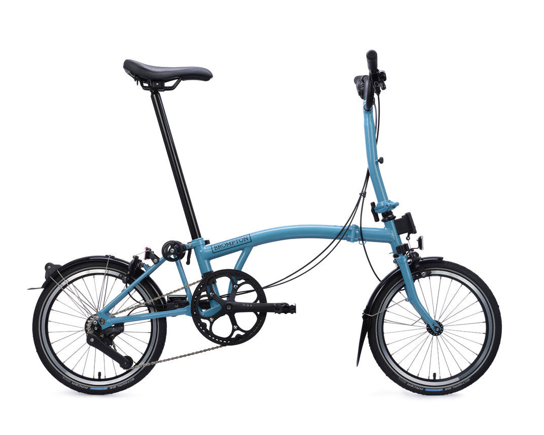 Blue folding bicycle on a white background