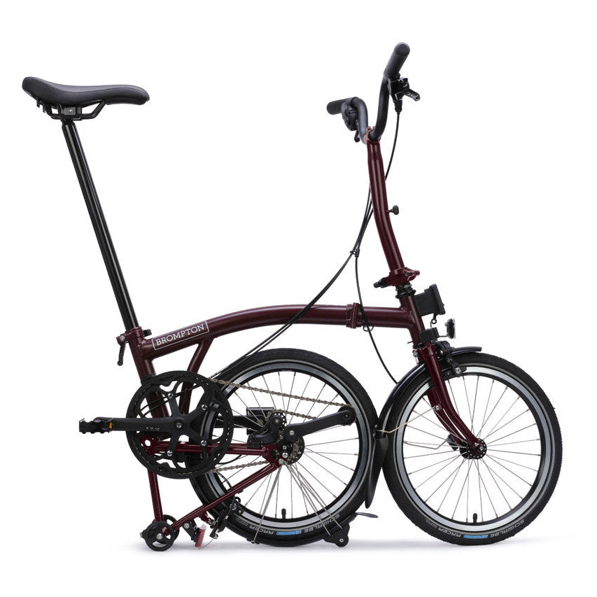 Folded bicycle on a white background