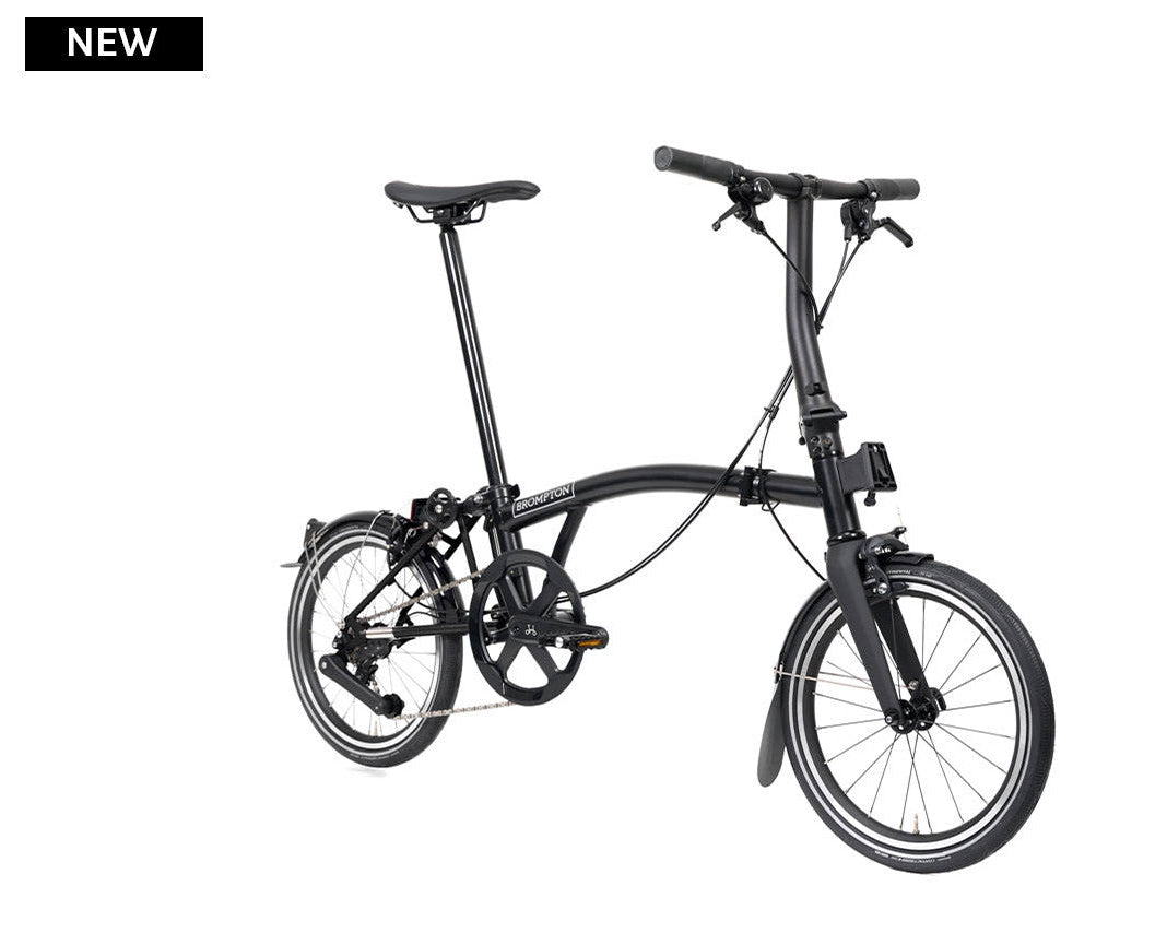Black folding bicycle on a white background