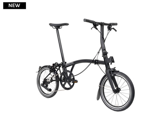Black folding bicycle on a white background