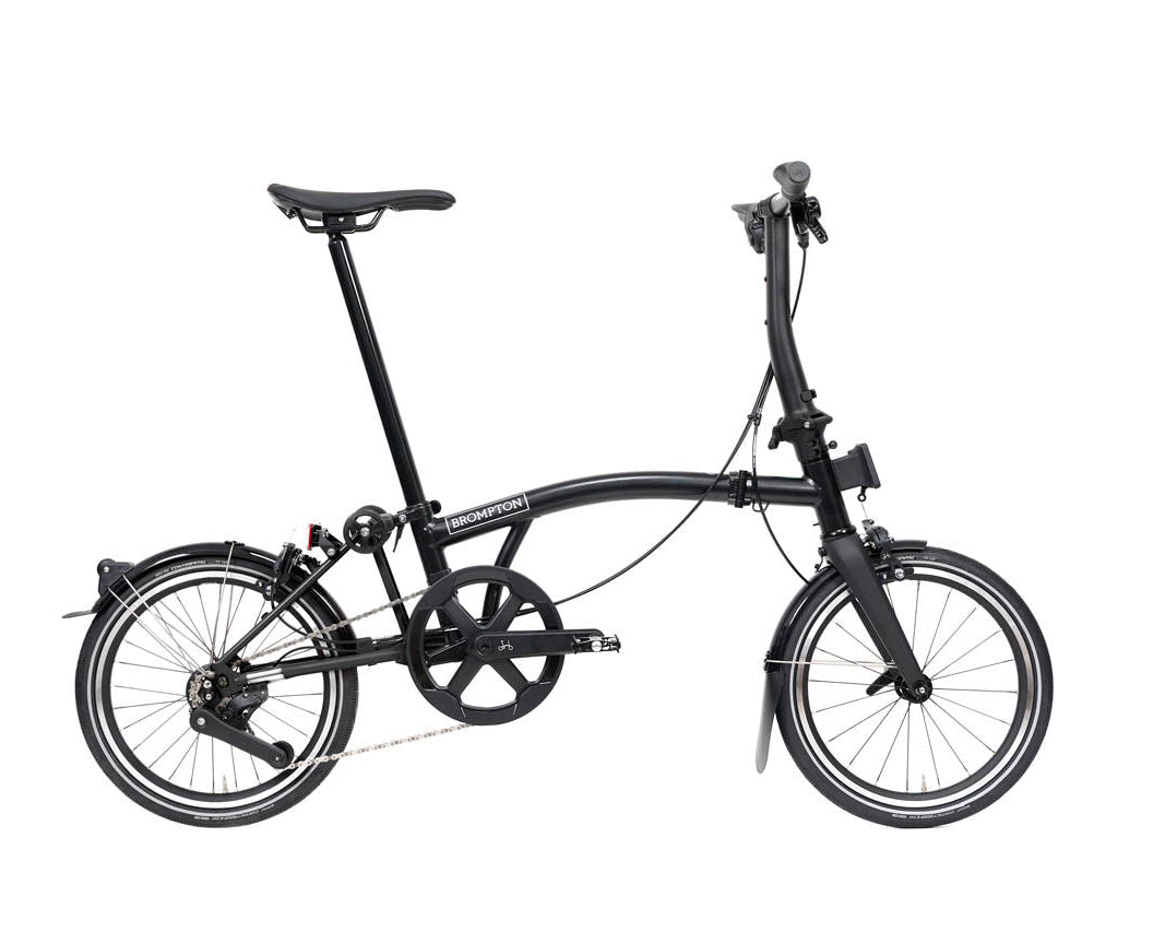 Black folding bicycle on a white background