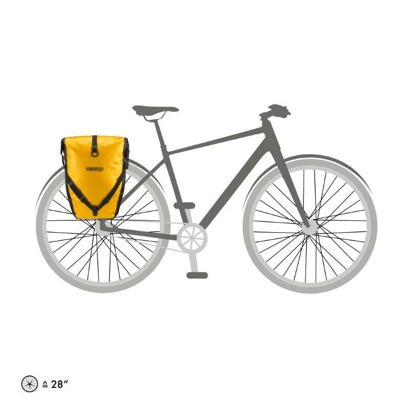 Bicycle with a yellow pannier bag on a white background