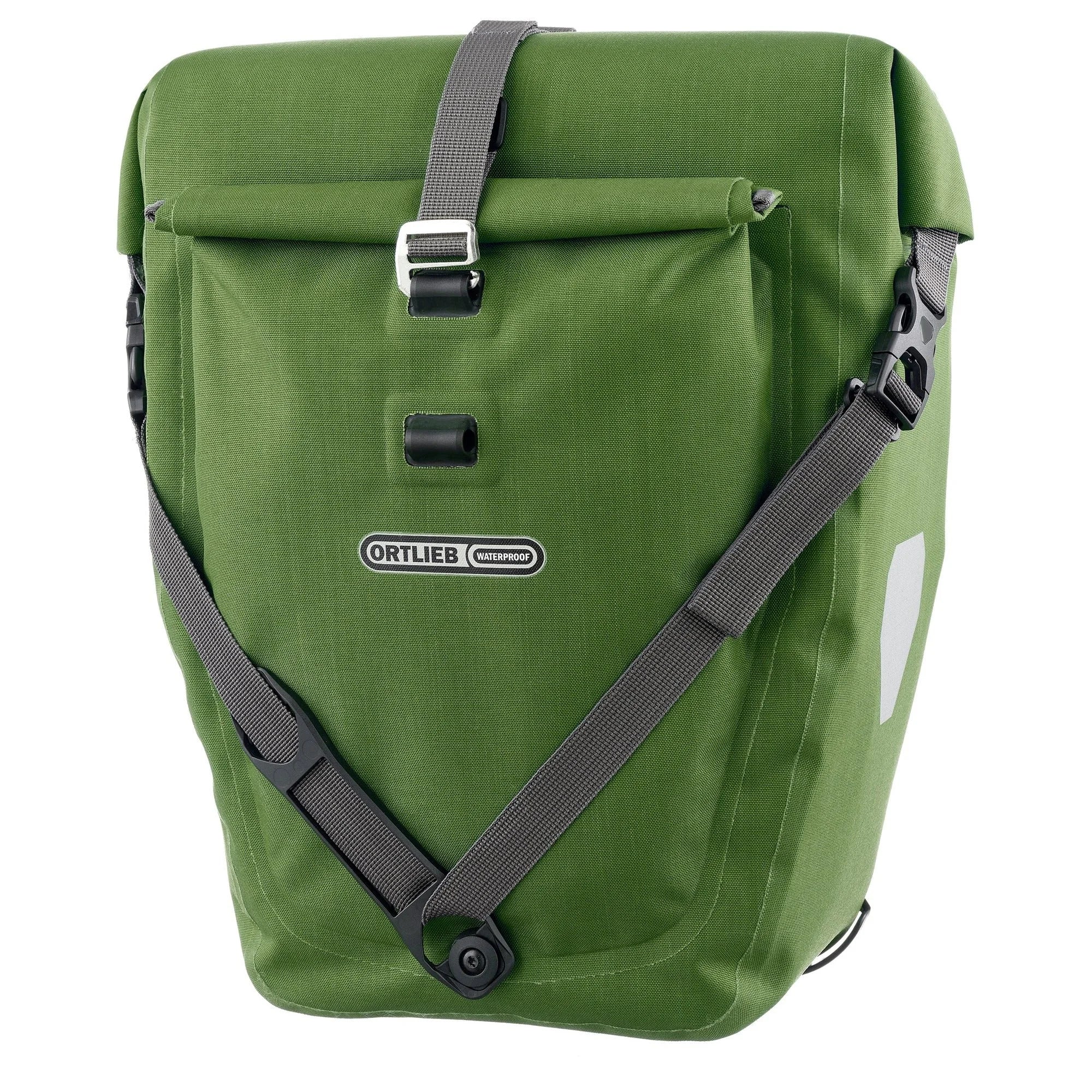 Green pannier bag with black straps on a white background