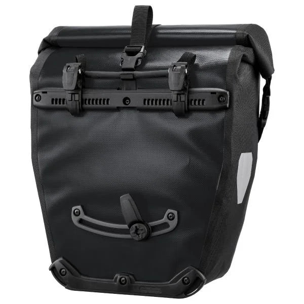 Black bicycle pannier bag on a white background