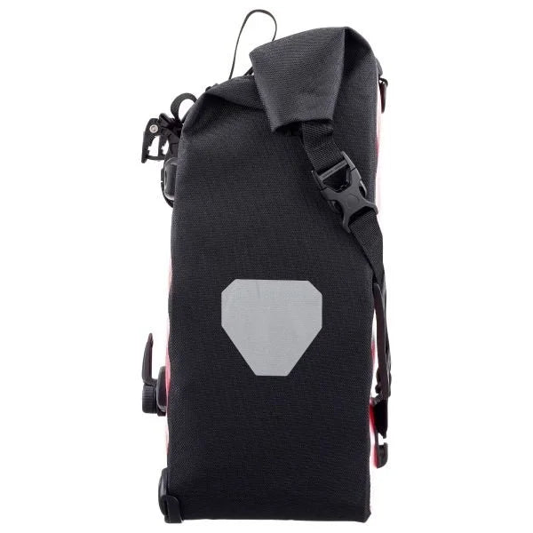 Black pannier bag with a geometric design on a white background