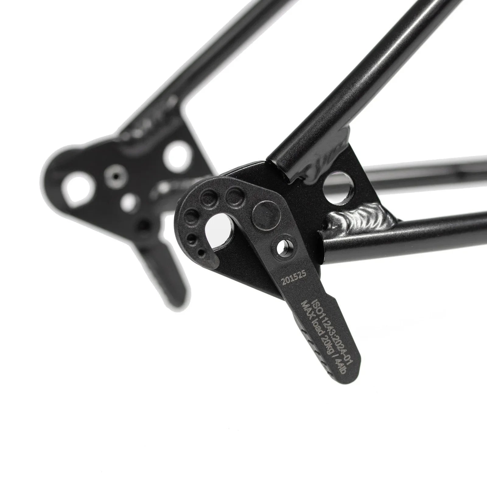 Close-up of a black metal bicycle frame's dropout with visible branding on a white background