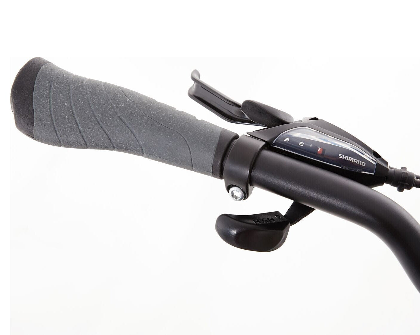Close up of a bicycle grip and gear shifter on a white background.