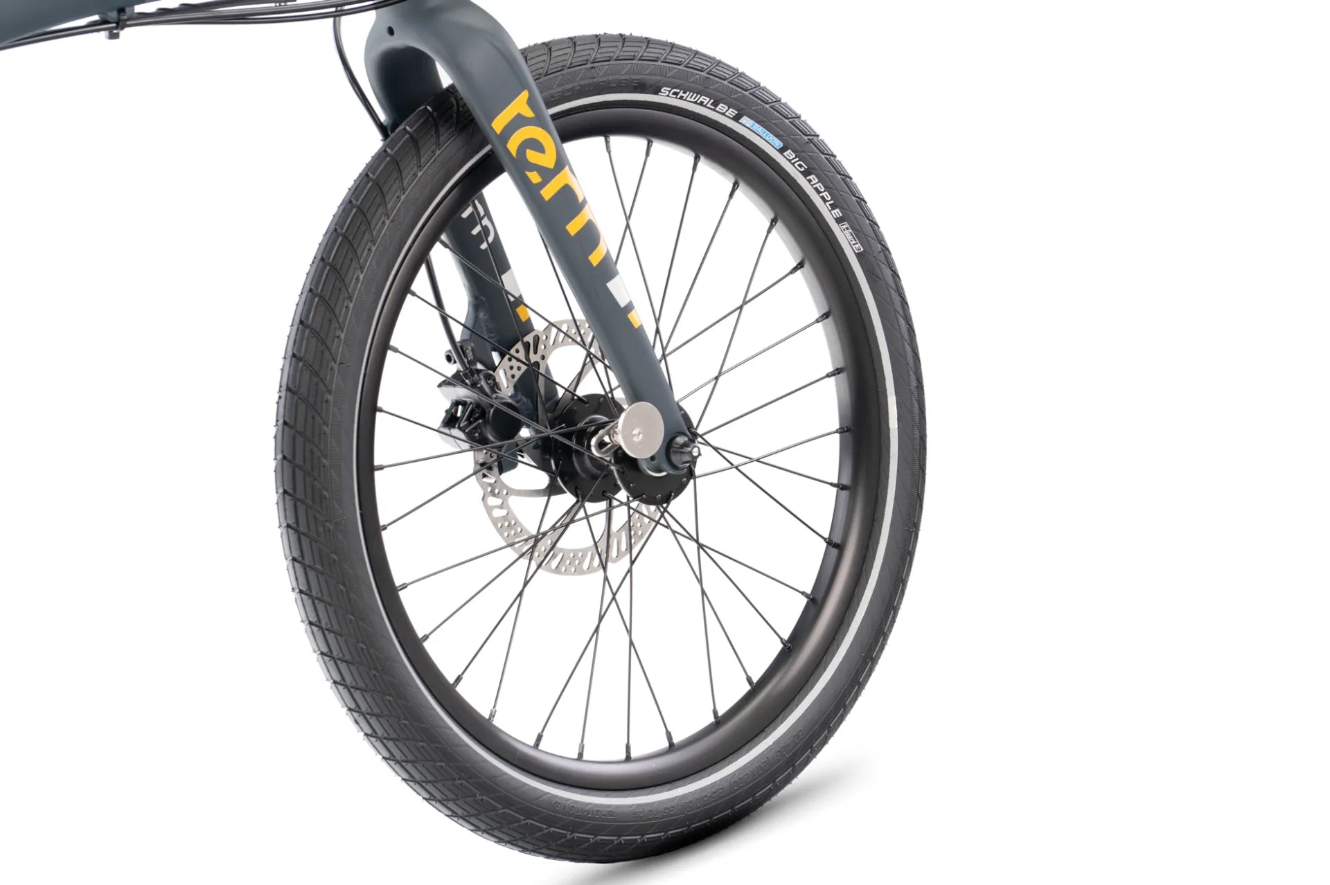 Close-up of a bicycle front wheel and fork on a white background, showing a black tire, black rim, disc brake, and yellow Teryx branding on the fork.