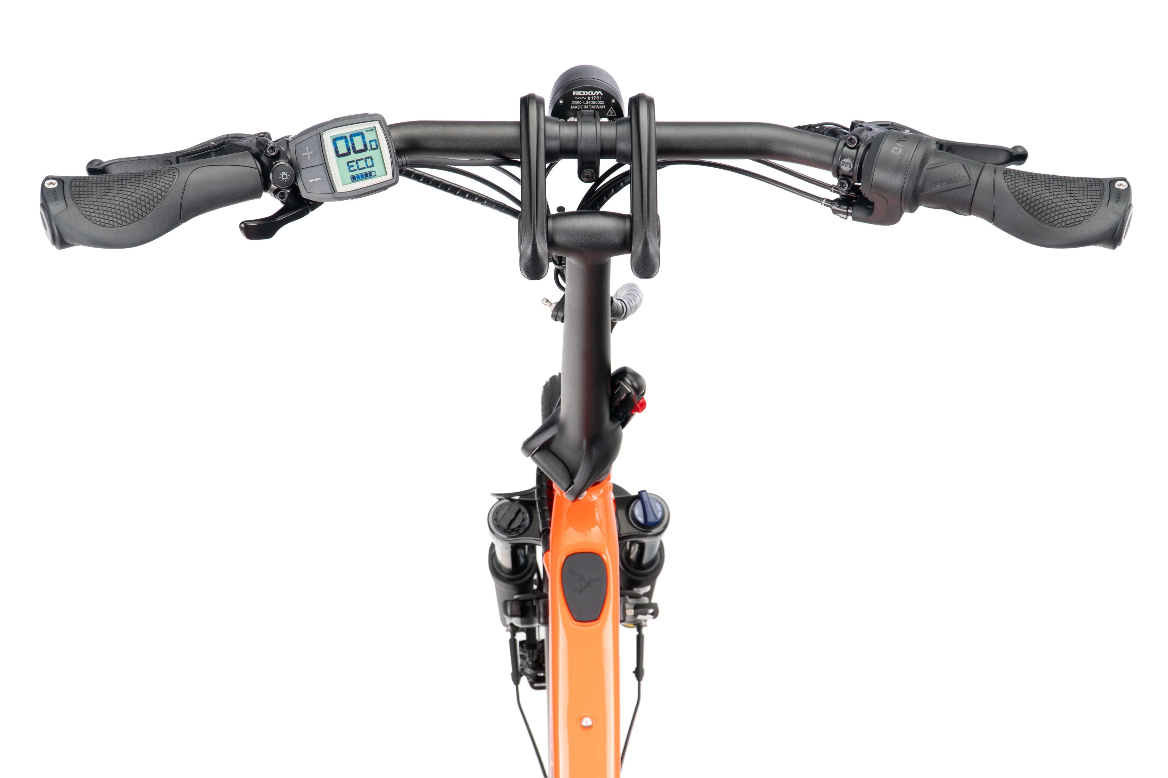 Close-up of a bicycle handlebar with control panel on a white background