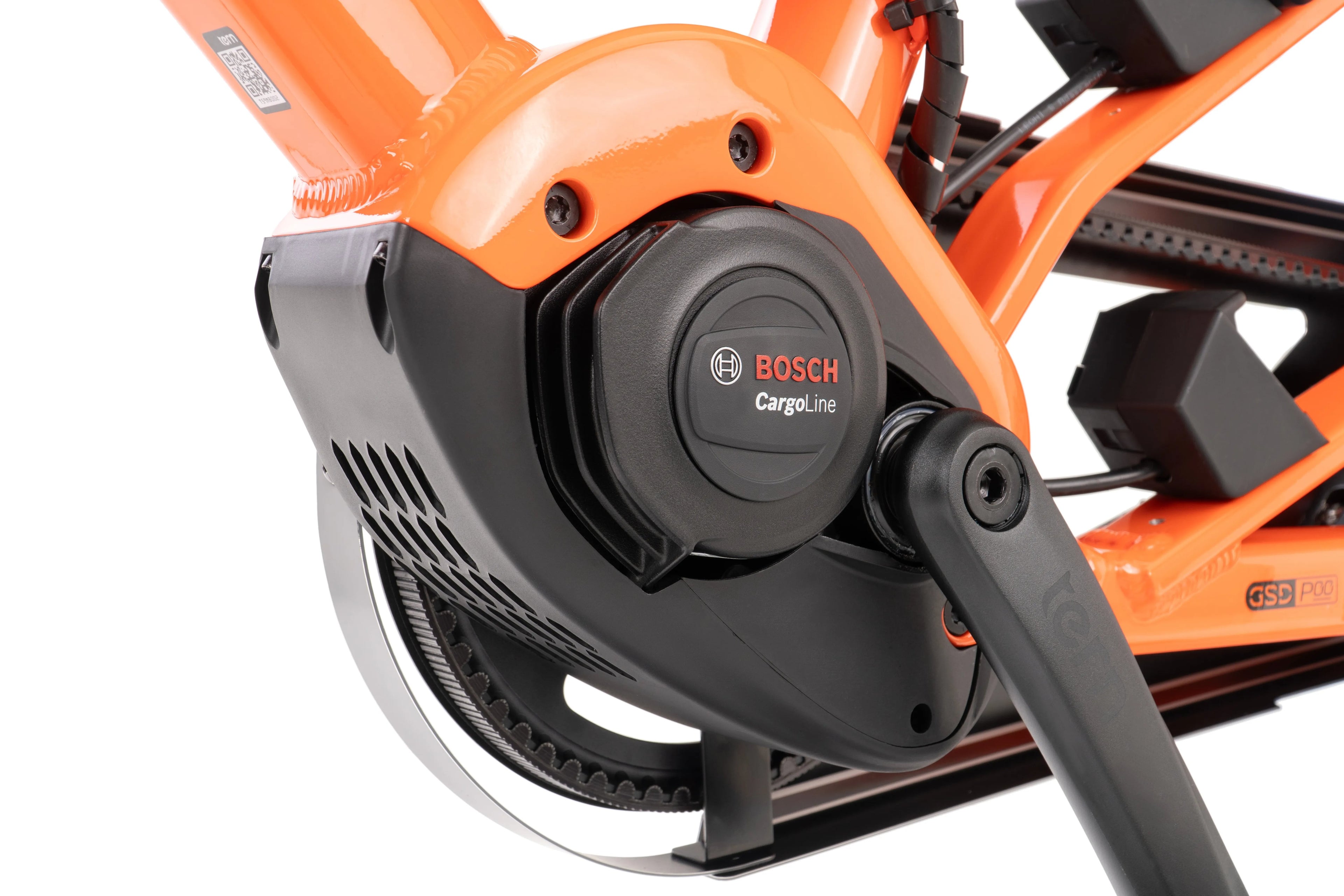 Close-up of an orange electric bike with Bosch motor on a white background