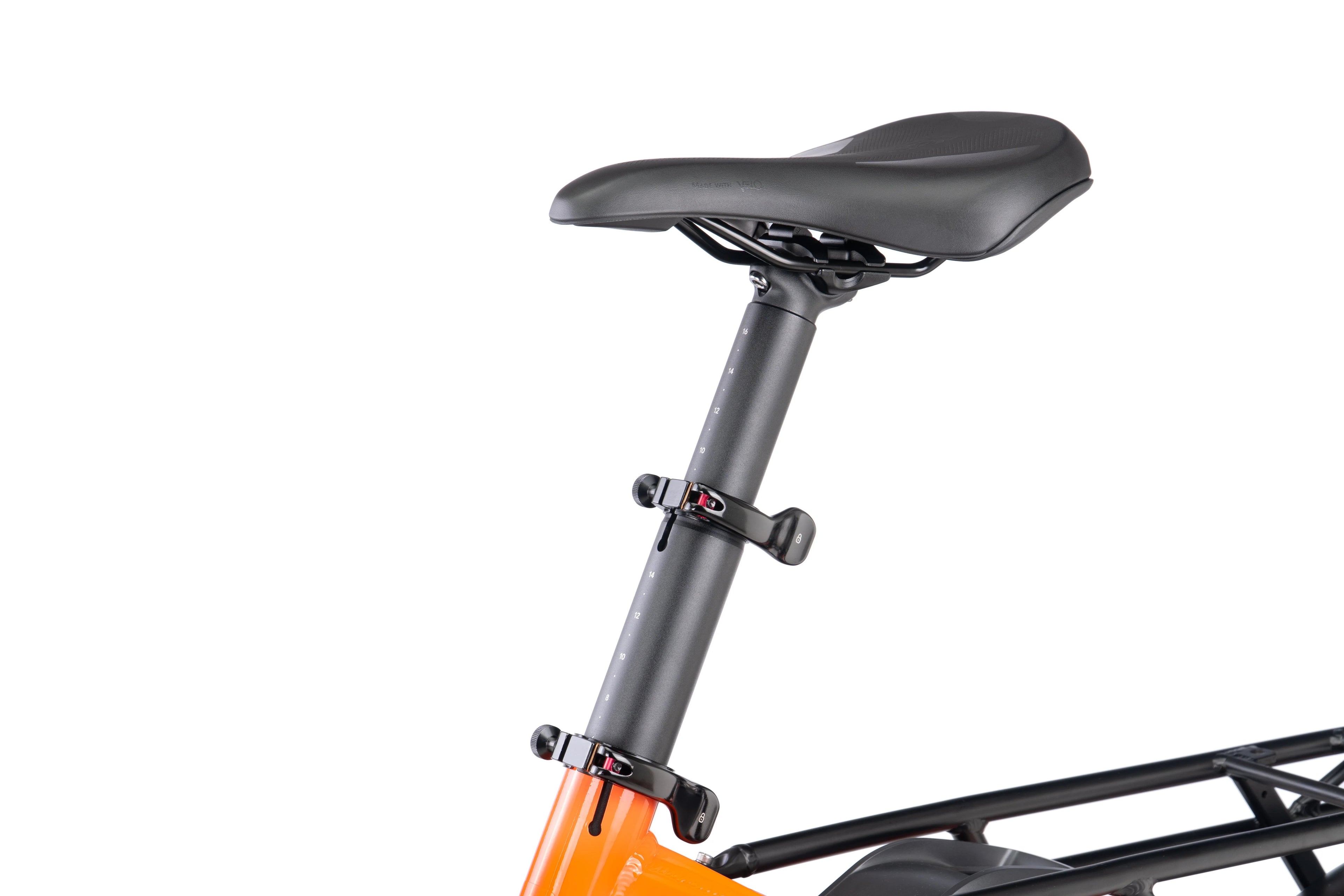 Bicycle seat post with black seat on an orange frame against a white background