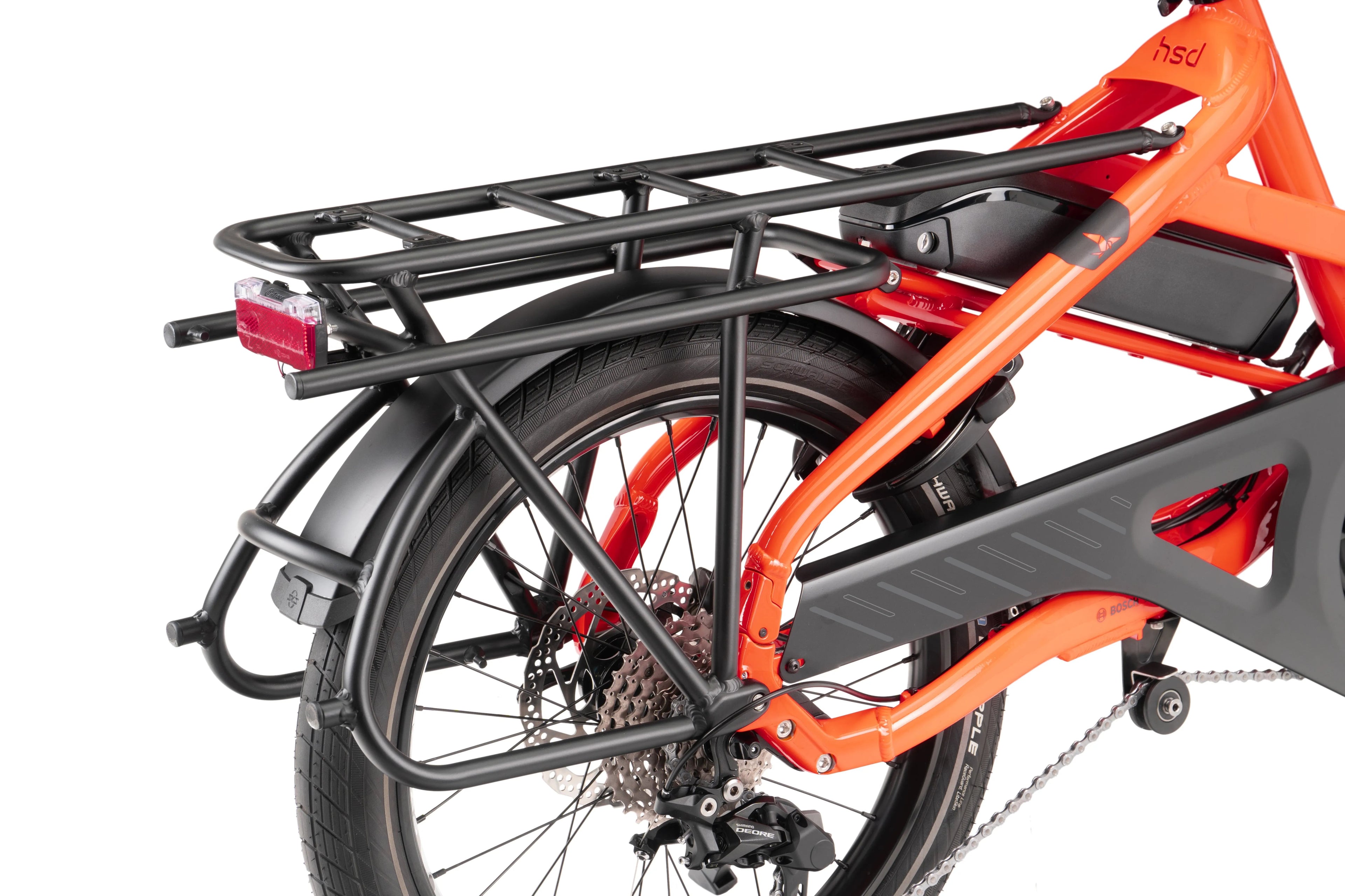 Orange electric bike with a black rear rack on a white background