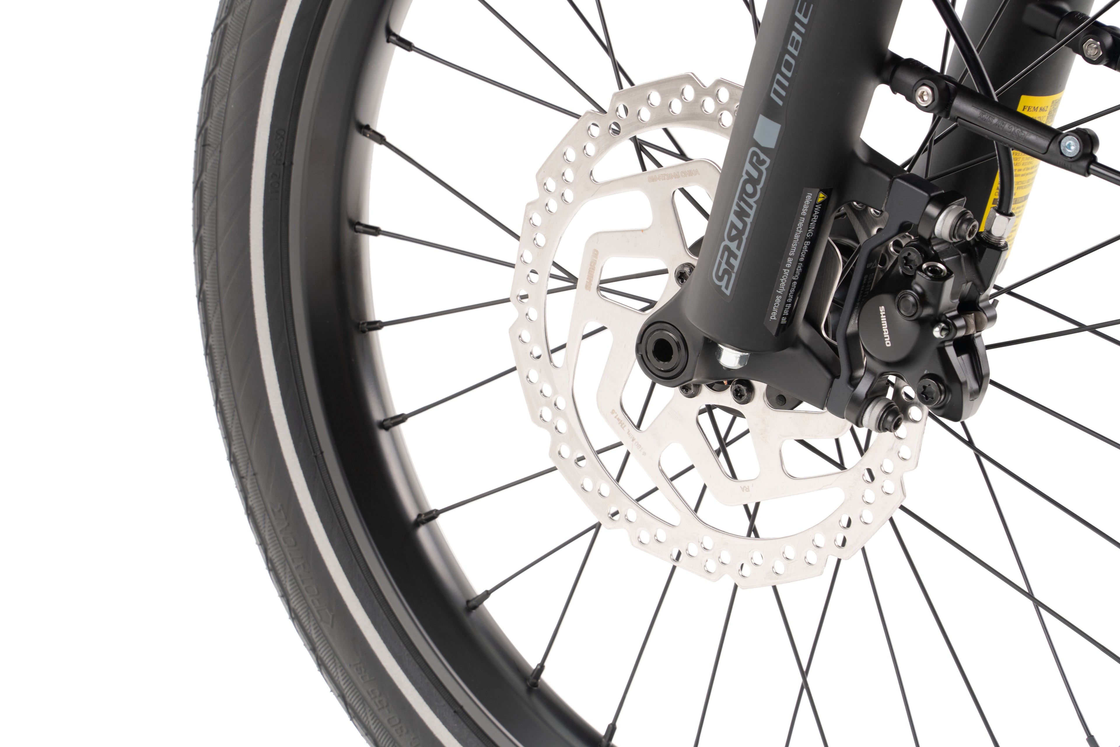 Close-up of a bicycle front wheel.