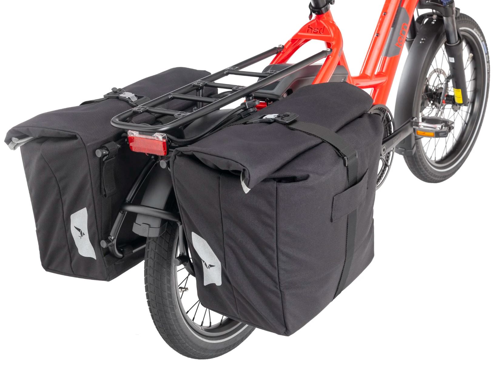 Bicycle with black pannier bags on a white background