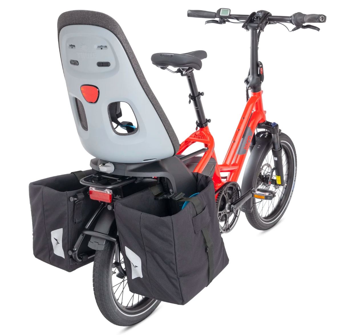 Red electric bike with a child seat and black panniers on a white background