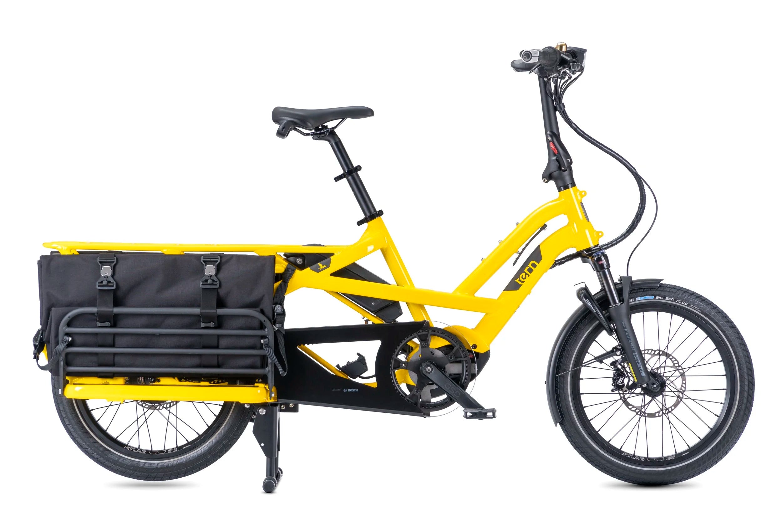 Yellow cargo bike with black accessories on a white background