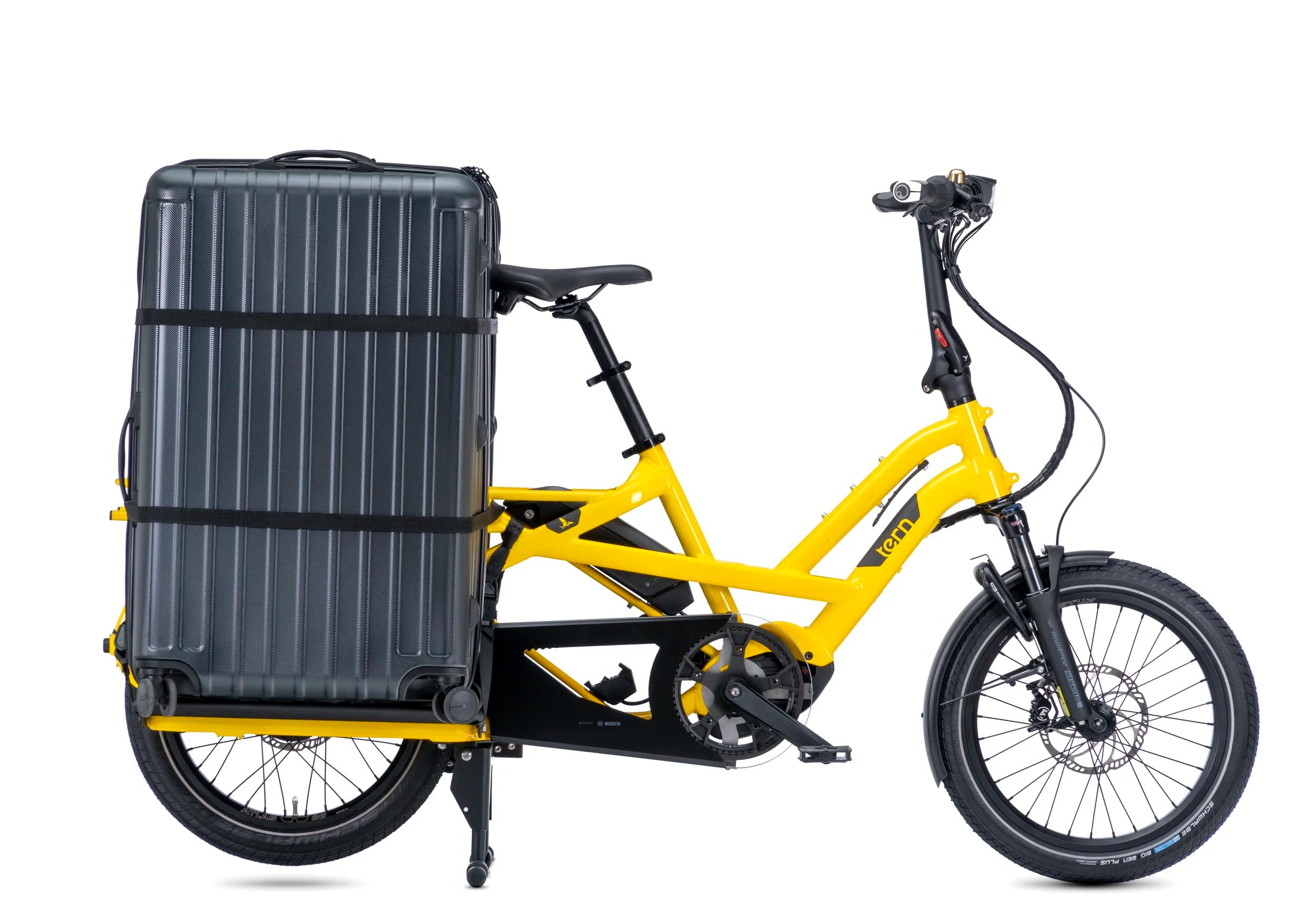 Yellow cargo bike with a black suitcase attached on a white background