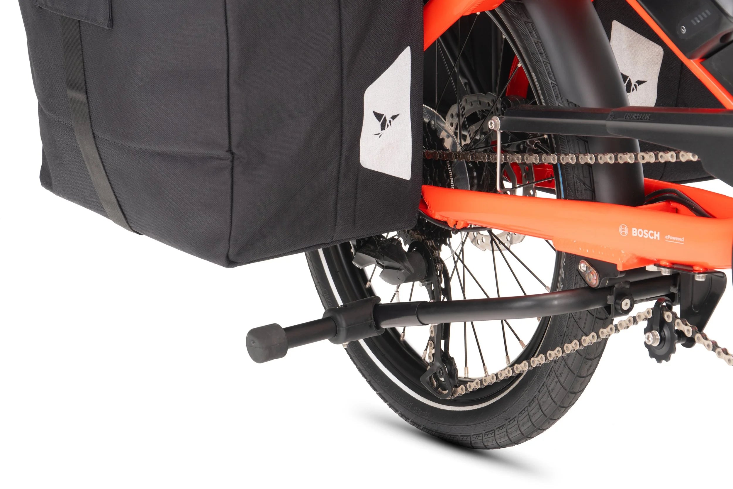 Close-up of a bicycle with a black bag attached, featuring Bosch branding.