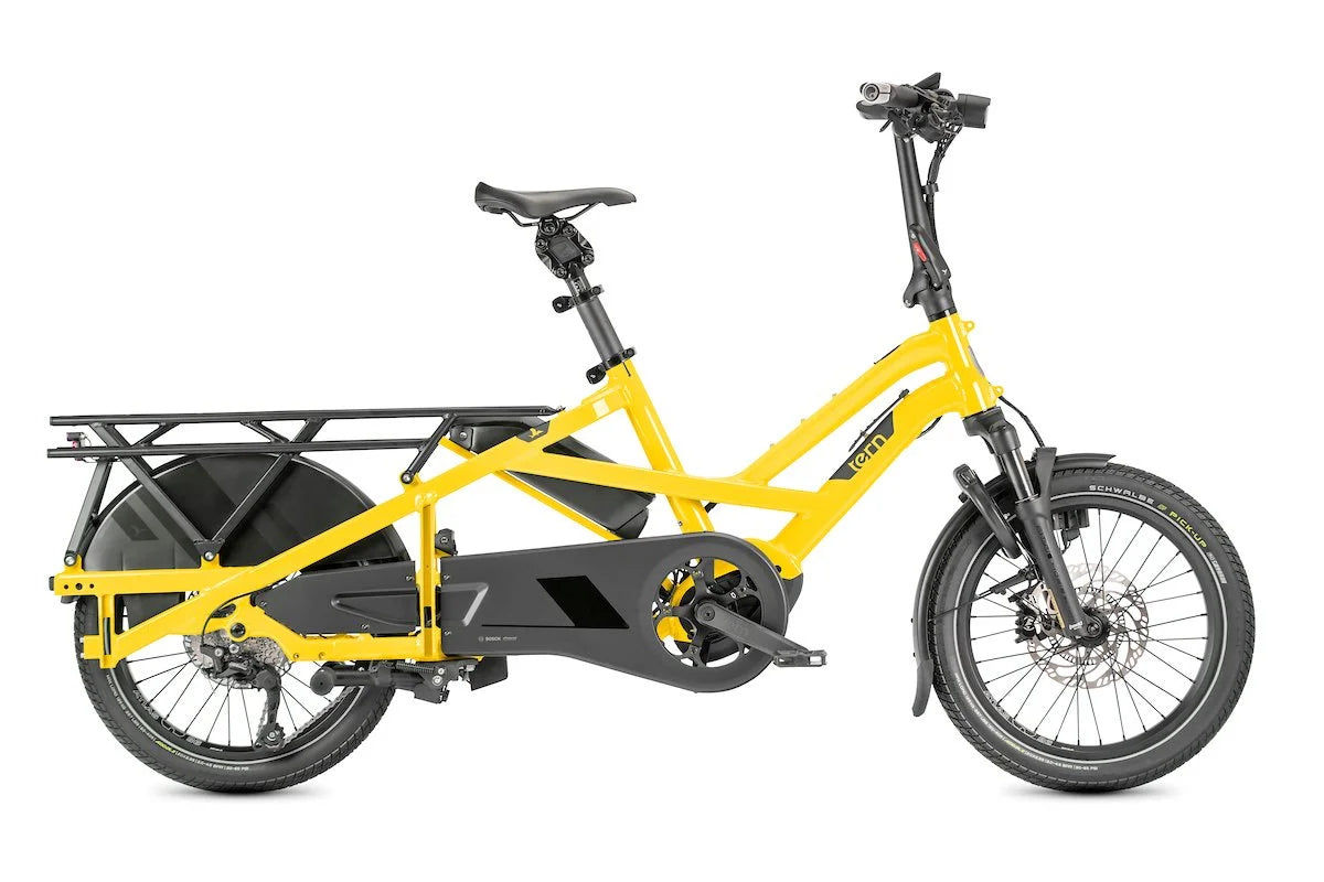 Yellow Tern electric cargo bike with a black rack on a white background.