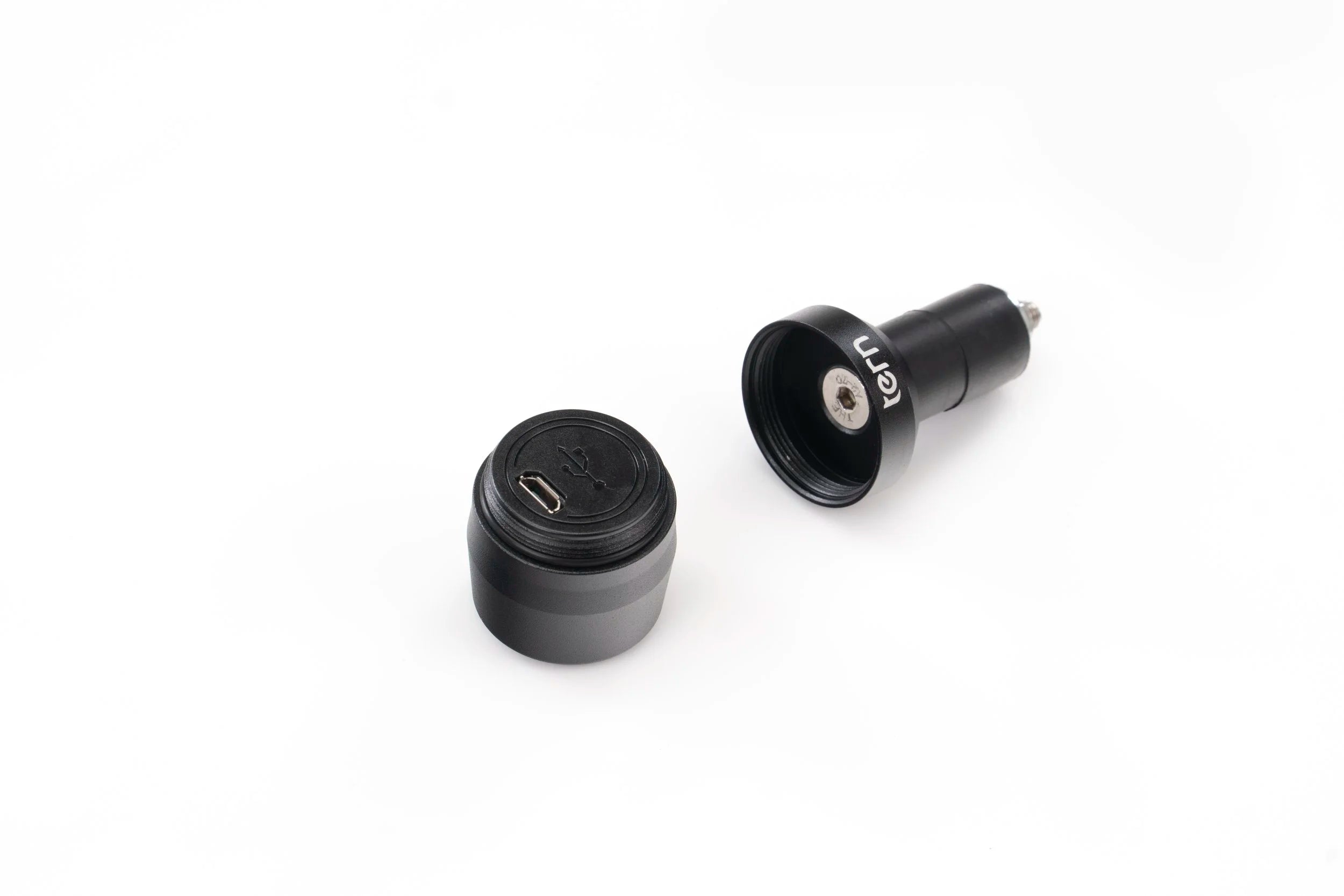Two black car chargers on a white background