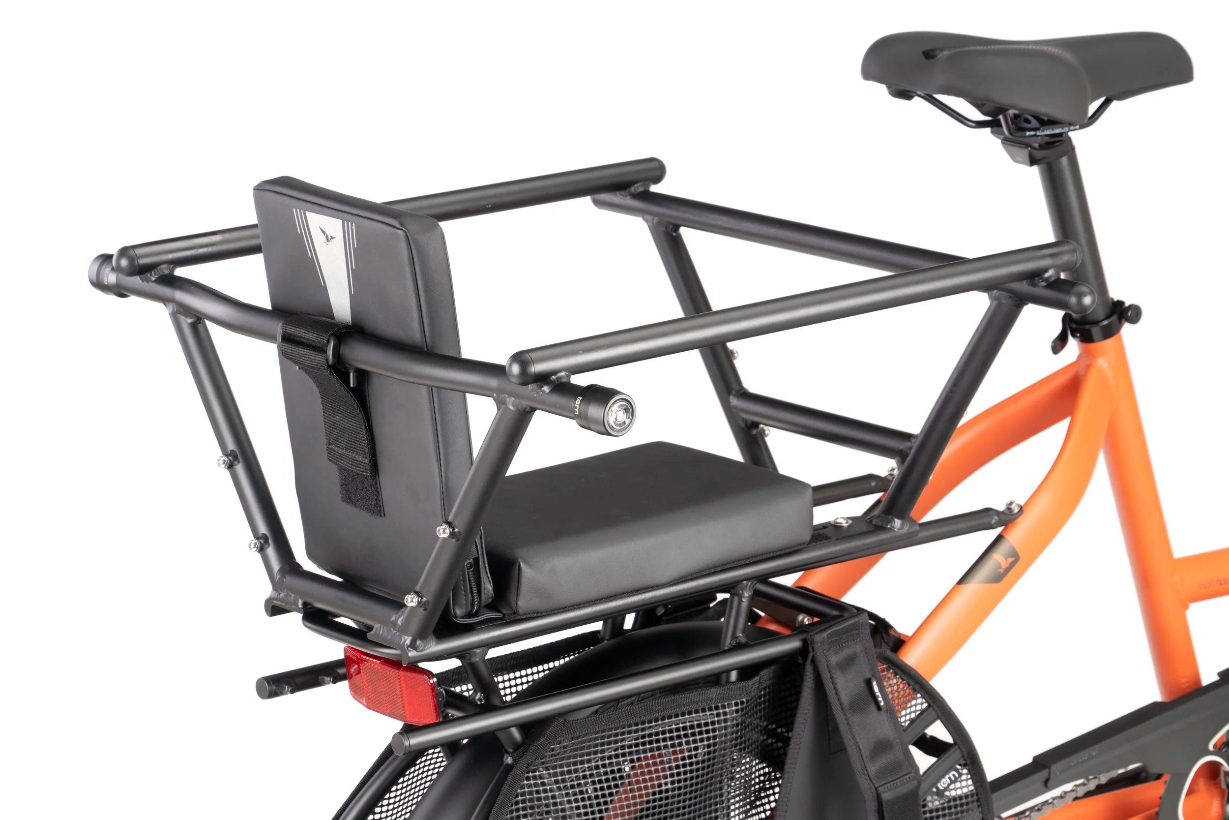 Orange bicycle with a black cargo rack and seat on a white background