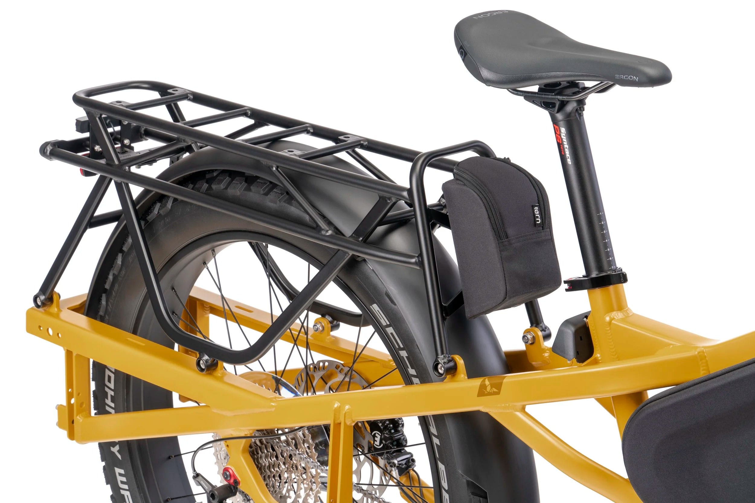 Yellow bicycle with black rack and seat on a white background