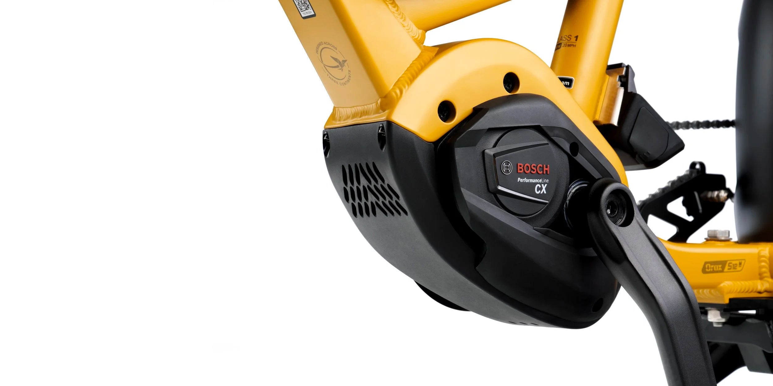 Close-up of a yellow bicycle with Bosch electric bike motor on a white background