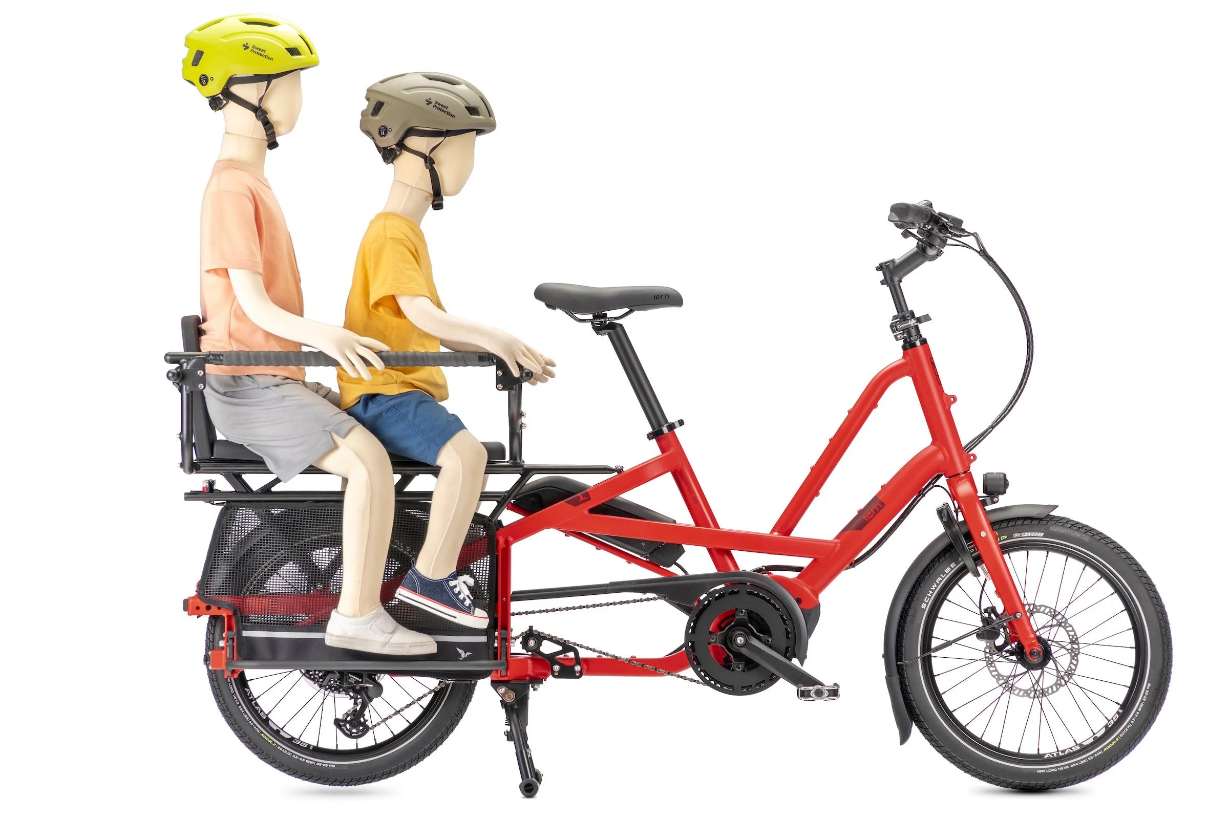 Red cargo bicycle with two figures wearing helmets on a white background
