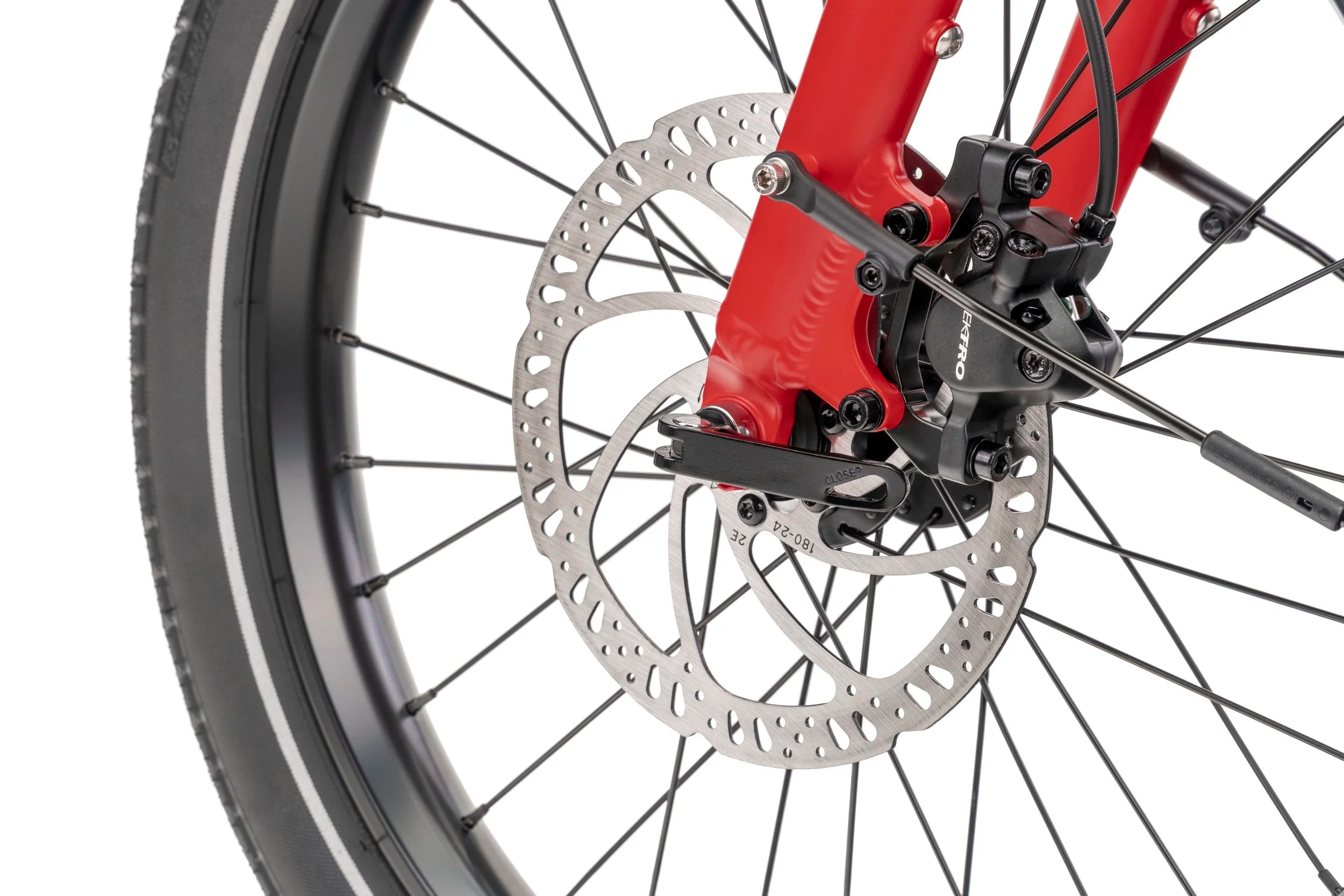 Close-up of a bicycle wheel with disc brake system on a white background