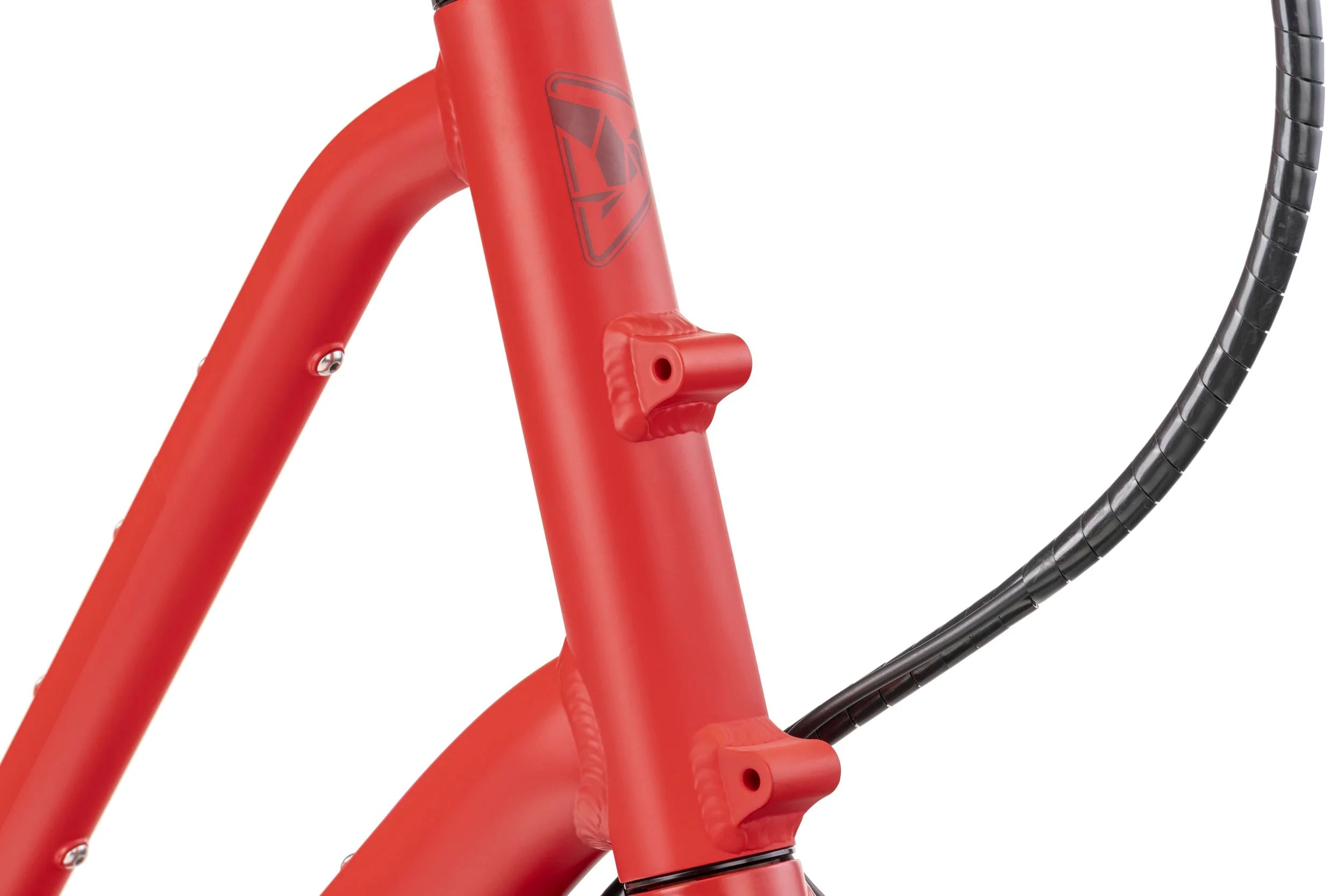 Close-up of a red bicycle frame with a visible brand tern logo on a white background