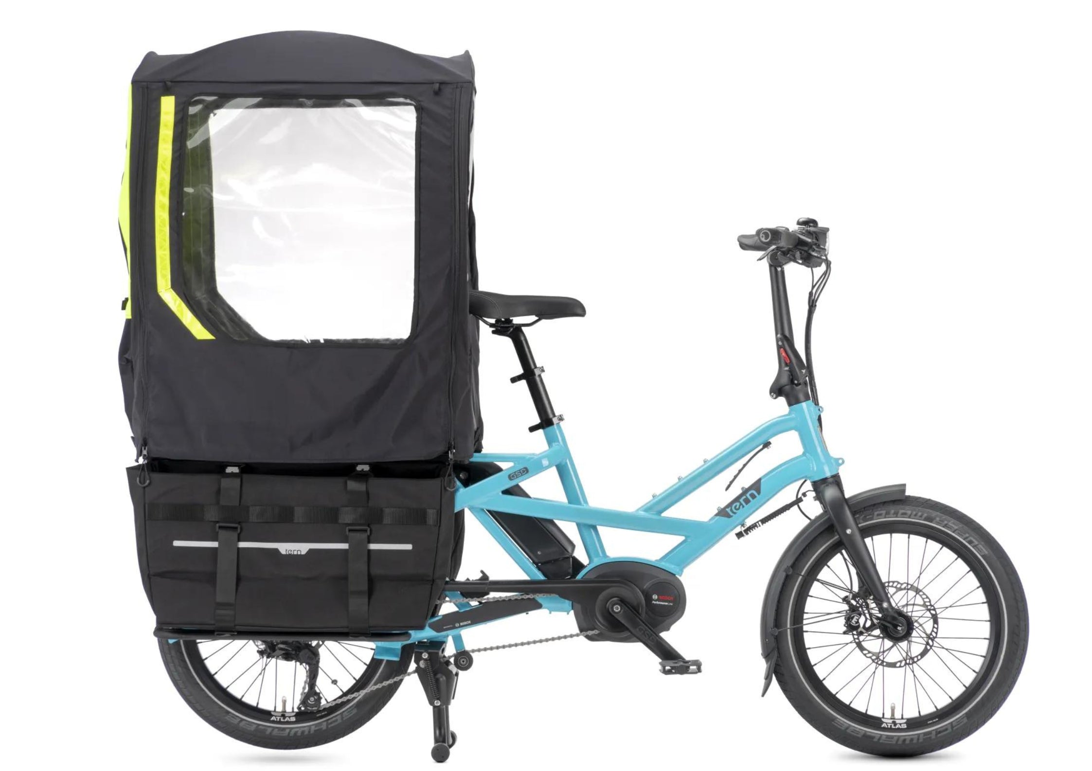 A blue Tern cargo bike with a child carrier with a rain cover on.